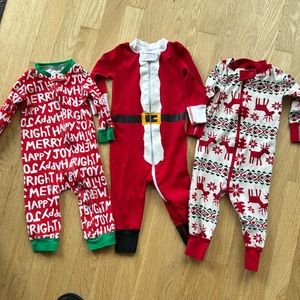 Three Christmas onesies